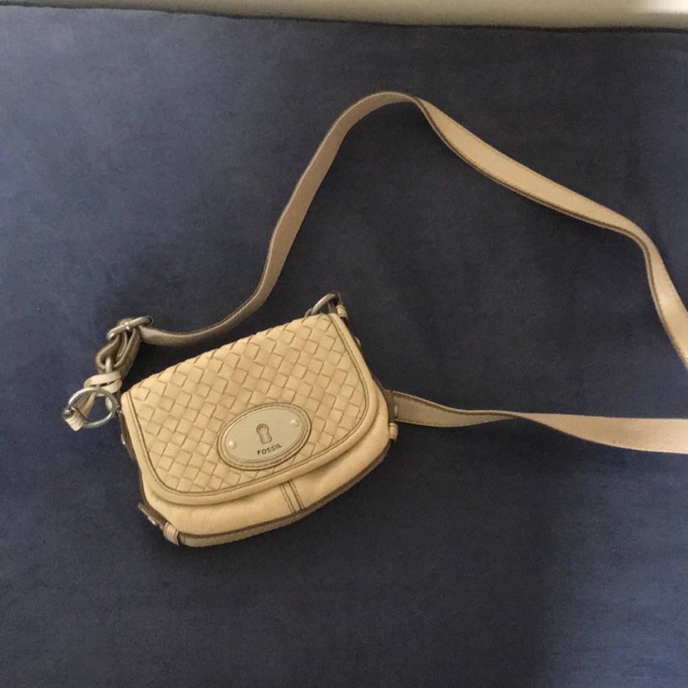Cream fossil cross body